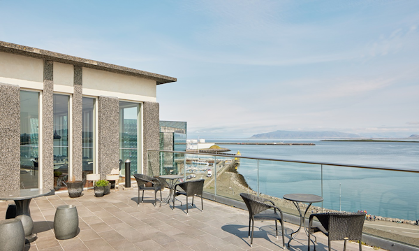 The SKY bar at Center Hotels Arnarhvoll features indoor and outdoor areas with stunning views across Faxafloi bay.