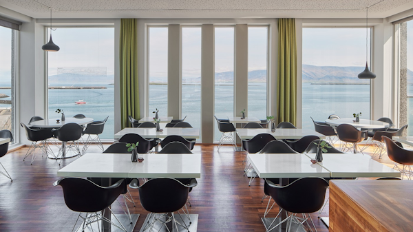The SKY venue on the eighth floor of Center Hotels Arnarhvoll offers a stunning spot to dine with views of Faxafloi bay.