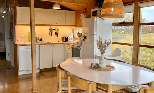 The kitchen and dining area at Hestaland Horse Farm Cottage.