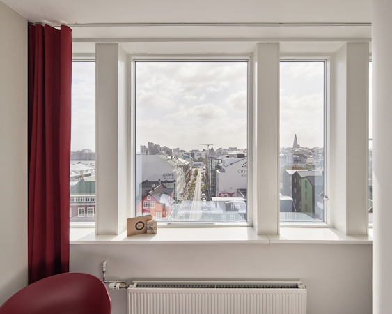 A city view through a window in a hotel room in Reykjavik.