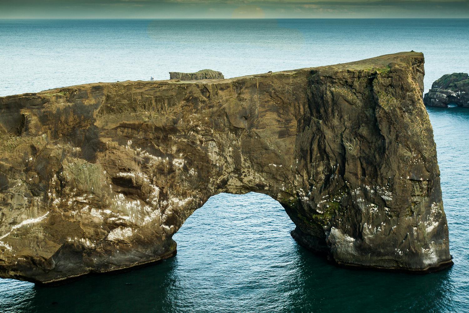 Dyrhólaey is instantly recognisable thanks to the distinctive rock arch that sits beneath the cliff face.