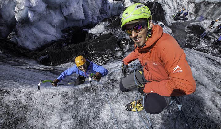 Your glacier guides will help you with your ice climbing adventure on an Icelandic glacier.