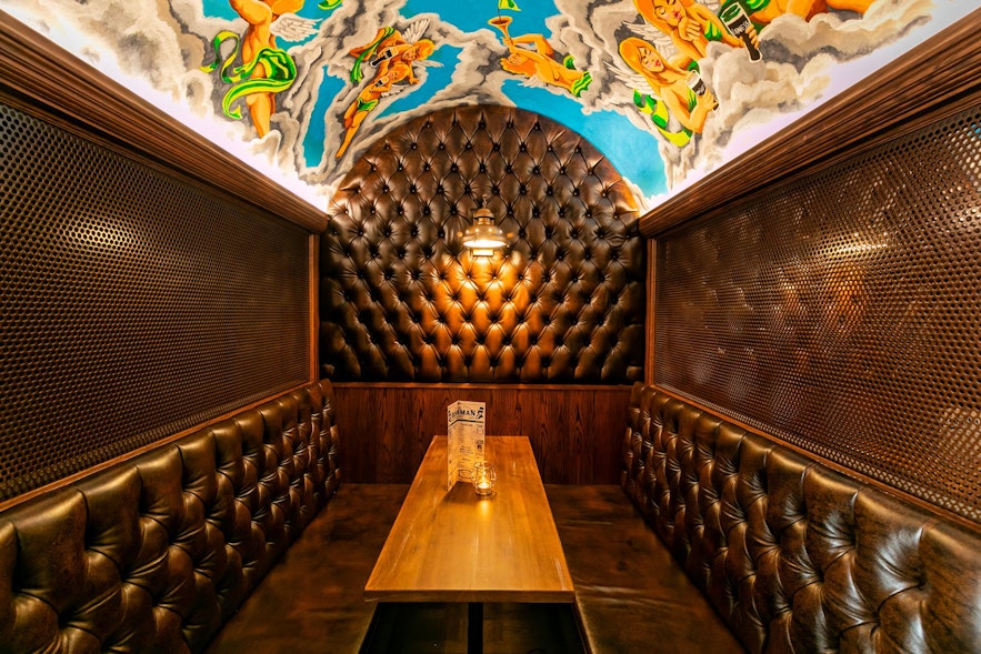Enjoy the leather booths for an intimate experience inside the Irishman Pub