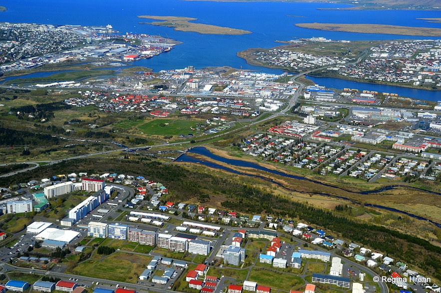 The view of suburbian Reykjavík from a helicopter