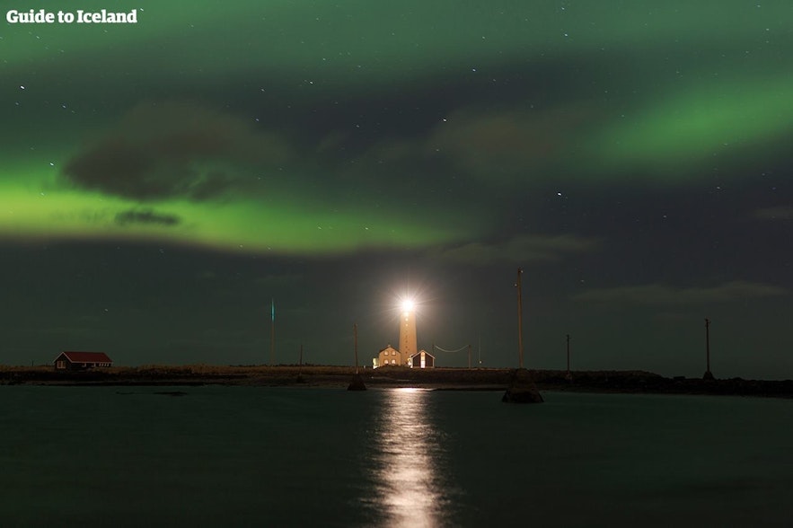Grótta Lighthouse beneath the aurora borealis.