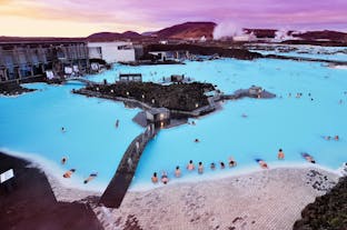 The milky-blue waters of the Blue Lagoon geothermal spa photographed from above.