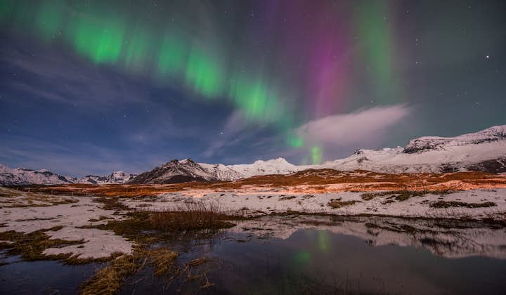 Iceland's snowy landscapes in winter provide a frozen wonderland above which you can marvel over the aurora borealis.