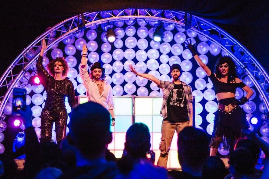 The Kings and Queens of Drag SÃºgur performing at the Masquerade Ball. From left to right: Aurora Borealis, Russel Brund, Turner Strait and Wanda Star.