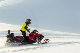 Driving a snowmobile across the Langjokull glacier is an exhilarating experience.