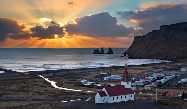 Vík, a town in South Iceland, has many incredible surrounding landmarks, such as Reynisfjara Beach.