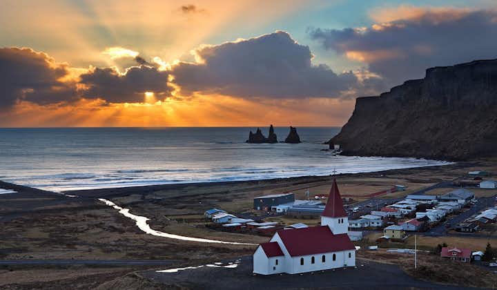 Vík, a town in South Iceland, has many incredible surrounding landmarks, such as Reynisfjara Beach.