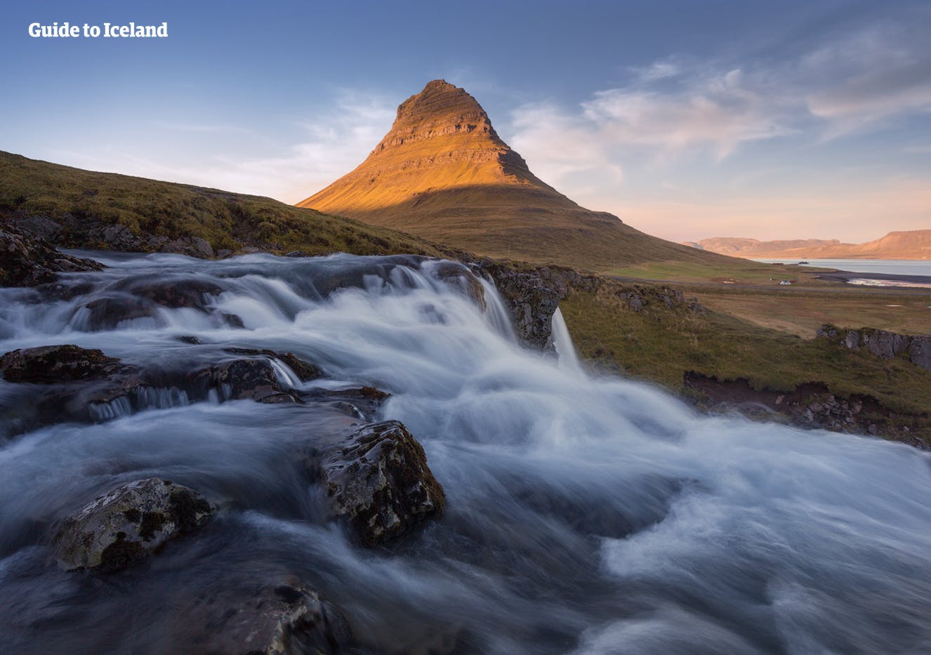 The Snæfellsnes Peninsula is filled with natural wonders like the majestic Kirkjufell mountain and the trickling waterfall in front of it
