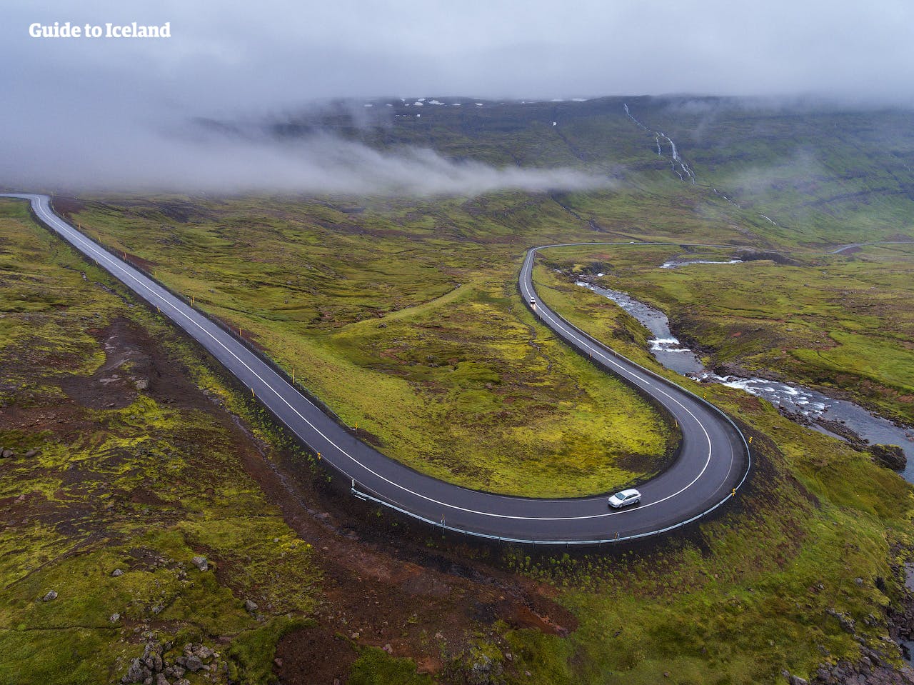 Driving the twisting mountain road of Seyðisfjörður in the East Fjords of Iceland.