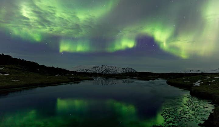 Bodies of water inland, such as at this Icelandic lake, are great to watch the northern lights from, as they reflect magically in the surface.