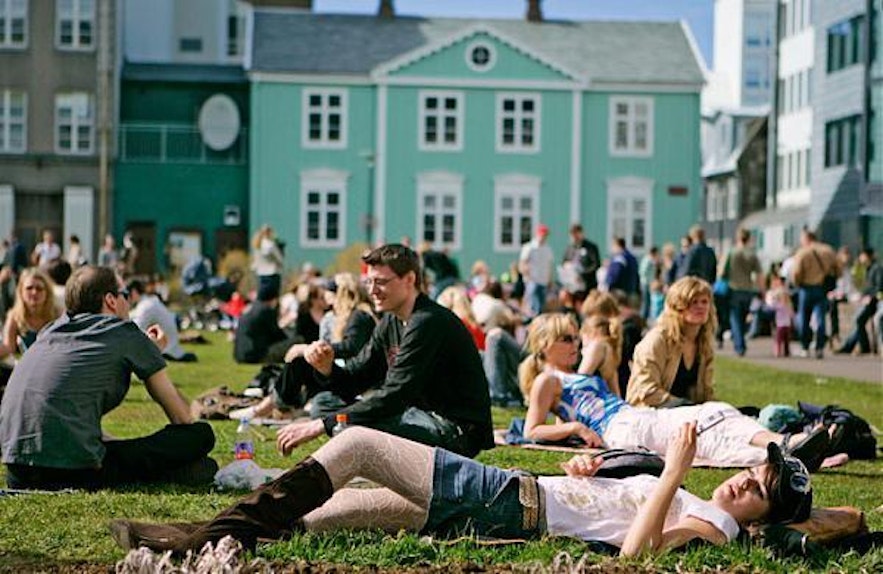 People drinking at Austurvöllur square in central Reykjavík