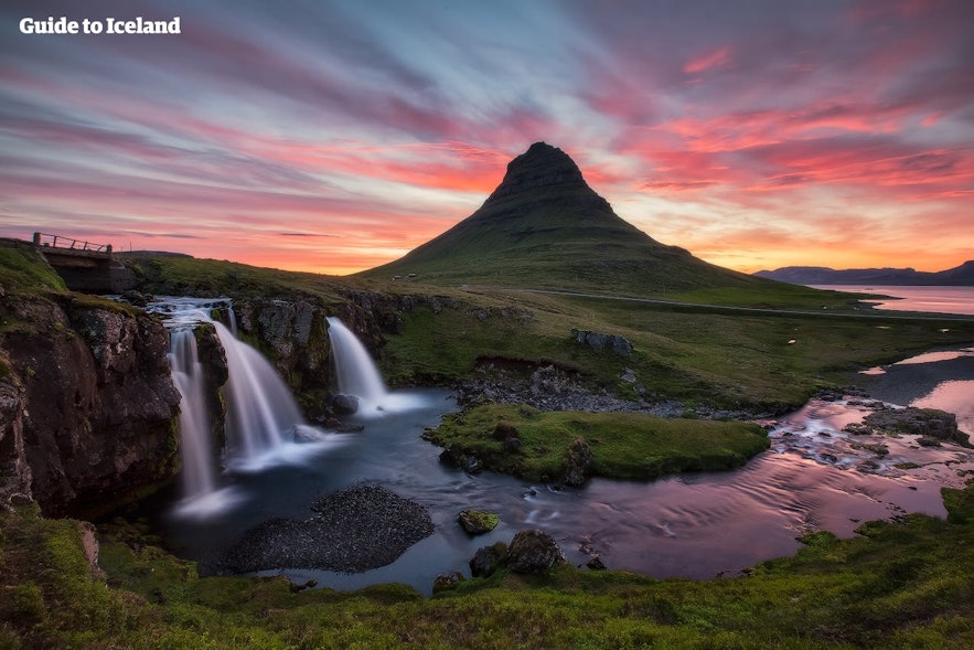 The distinctive shape of the mountain Kirkjufell and its resident waterfall Kirkjufellsfoss are what draws nature photographers to the Snæfellnes Peninsula.