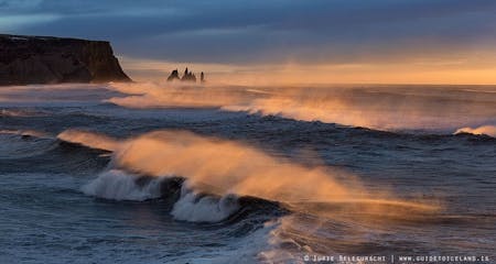 waves-crashing-on-shore-in-the-low-sunlight-at-reynisfjara-black-sand-beach-18.jpg