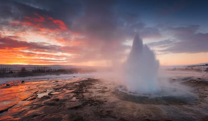 Breathe in the cold air as you watch the geyser Strokkur erupt on your winter self-drive tour.
