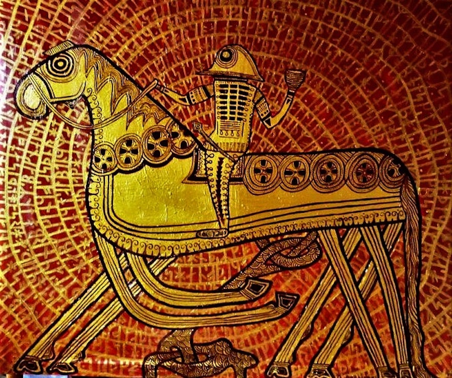 The Norse god Odin on his horse Sleipnir.