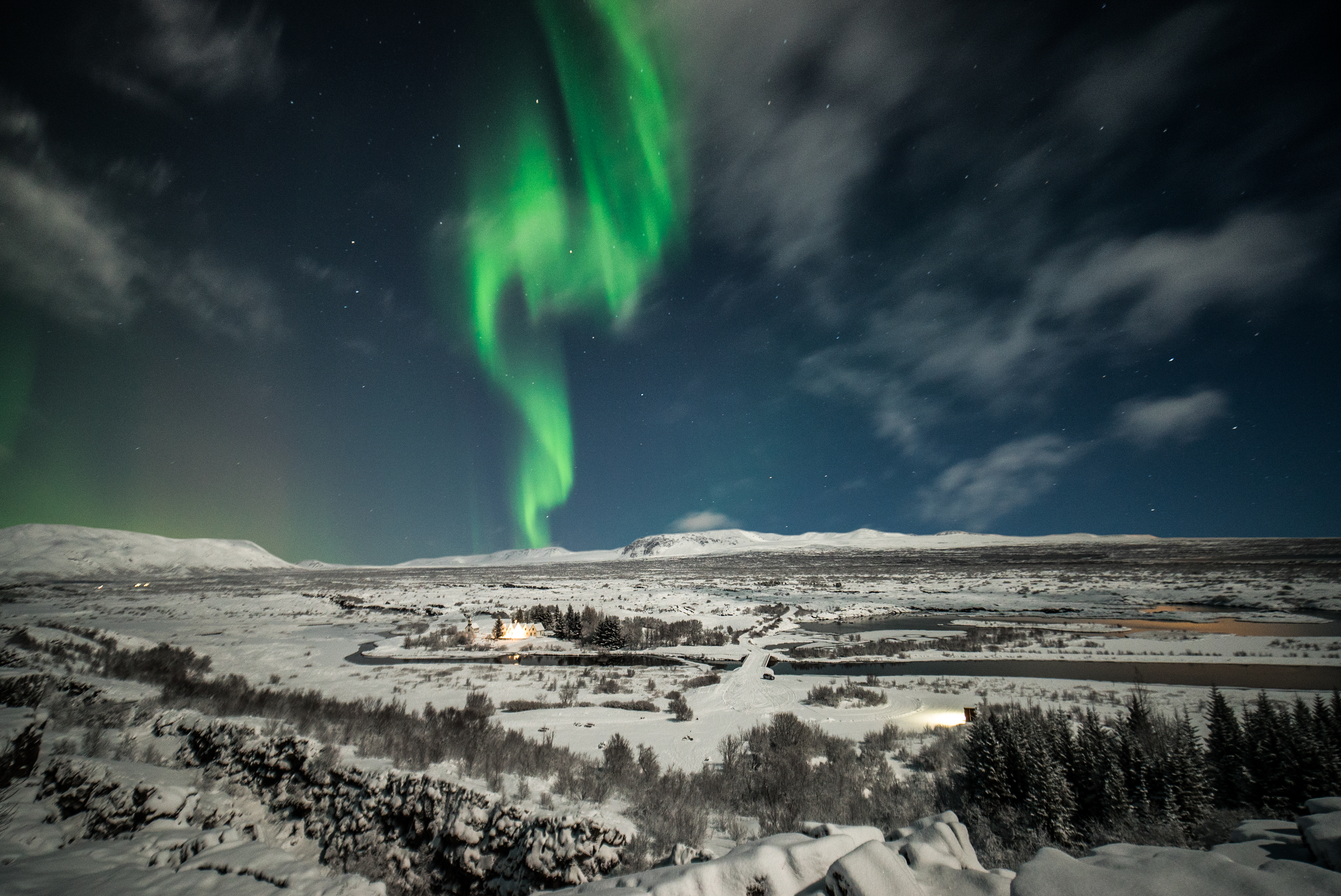 The beautiful Northern Lights moving like dancers in the sky above Þingvellir National Park.