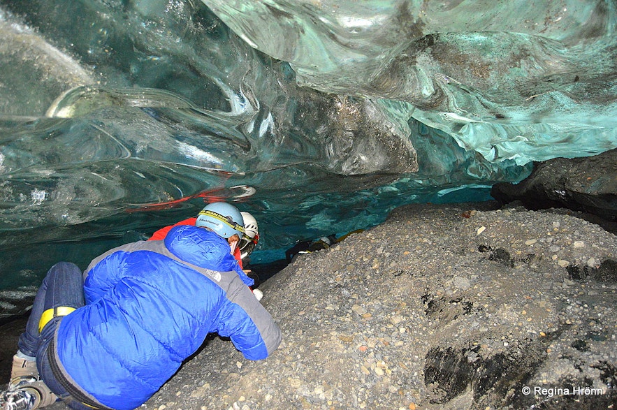 Crawling into the ice cave in Fláajökull glacier
