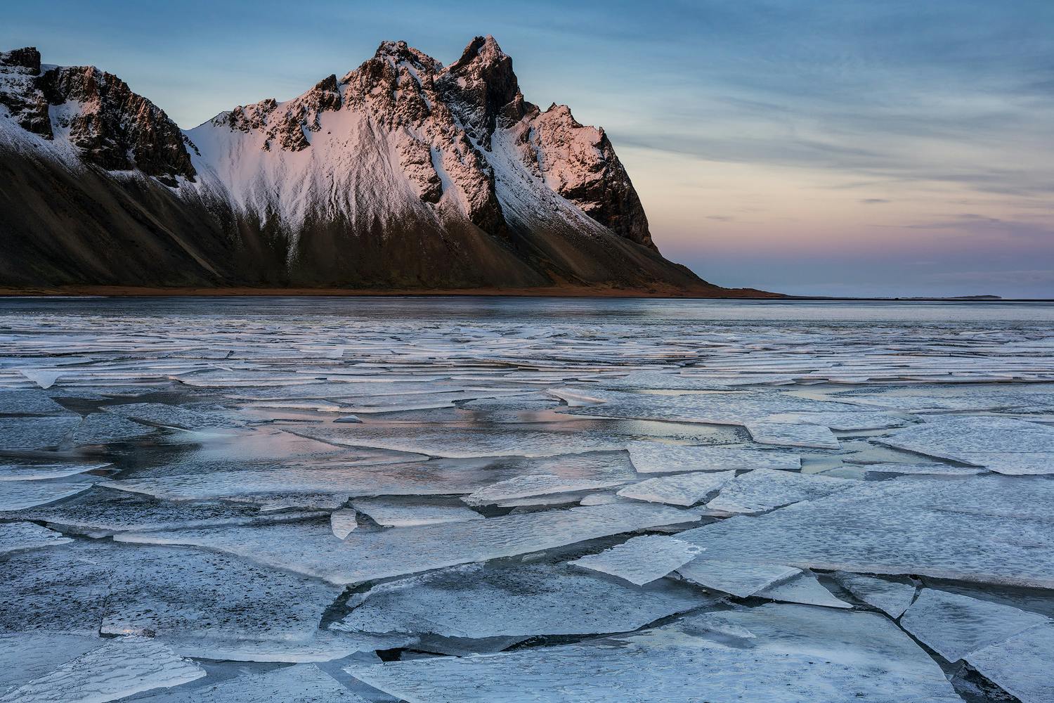 The dramatic Vestrahorn mountain in a sea of ice.