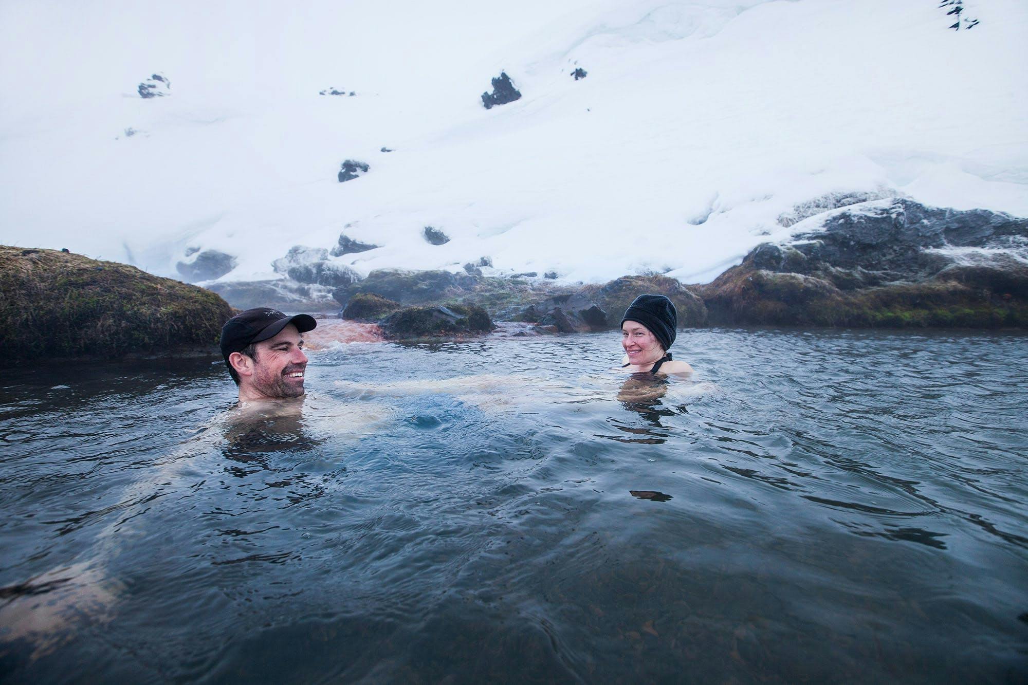 Bathing in a hot spring in Landmannalaugar in winter is a great way to stave off the chill.