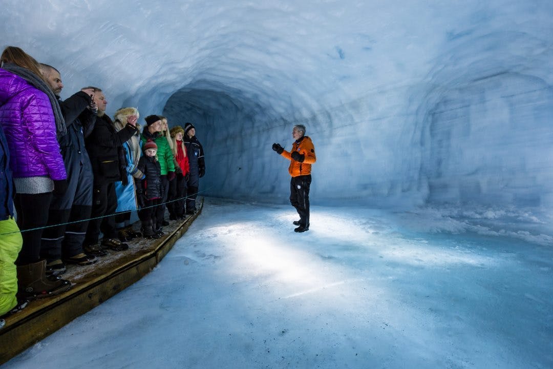 An experienced glacier guide will lead you through the intricate ice cave tunnels at Langjökull glacier.