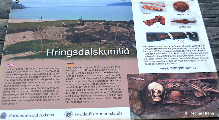 An information board detailing the Hringdalskumlið pagan graves