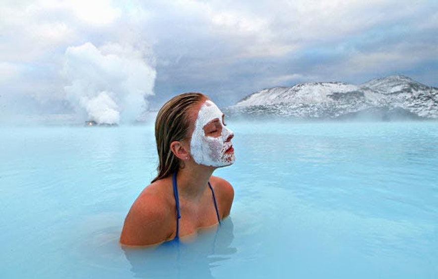 A young traveller enjoying the relaxing ambience of the Blue Lagoon Spa.
