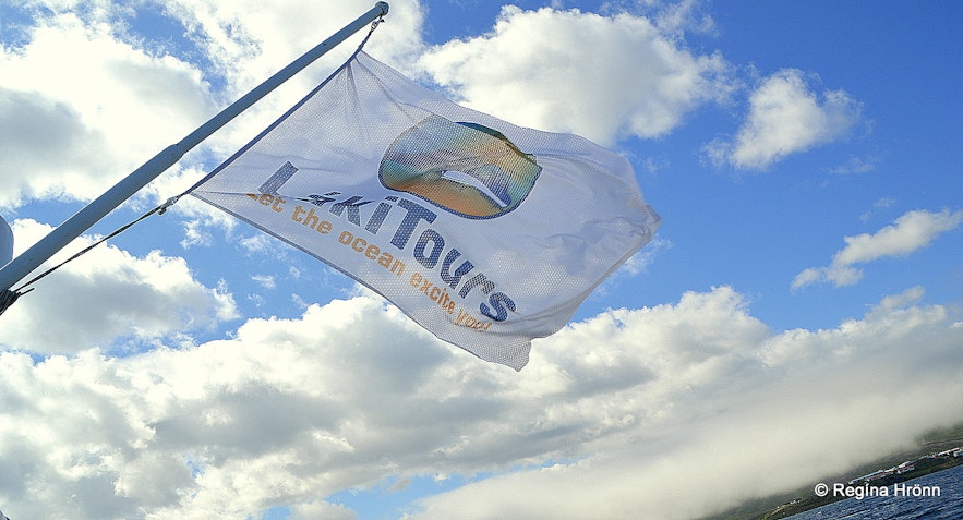 The flag of Láki tours whale watching