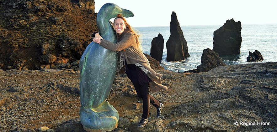 Regína by the great auk statue on Reykjanes