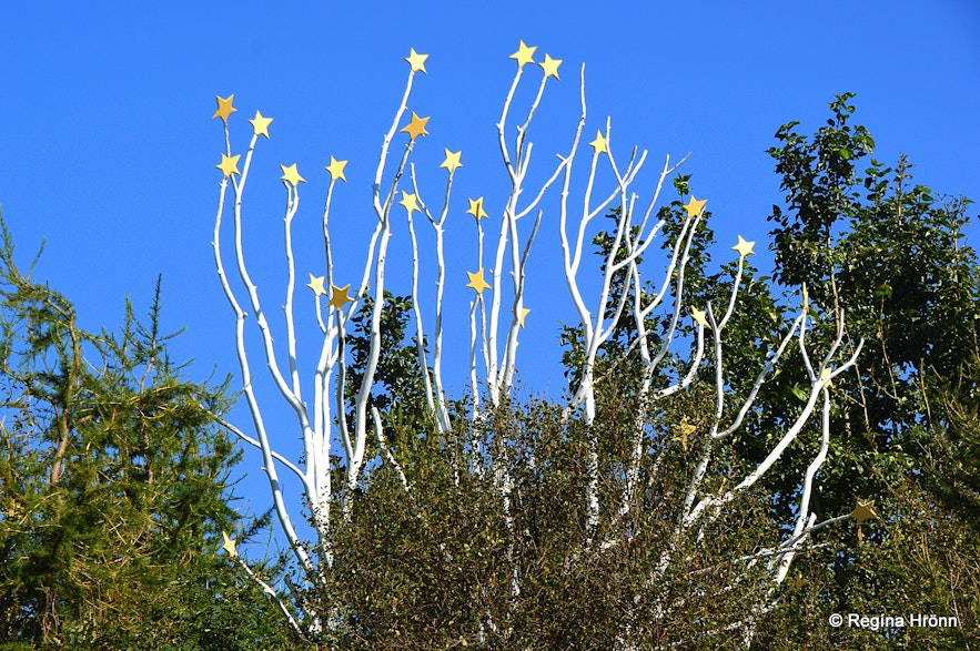 White tree with stars on top of its branches representing unborn children