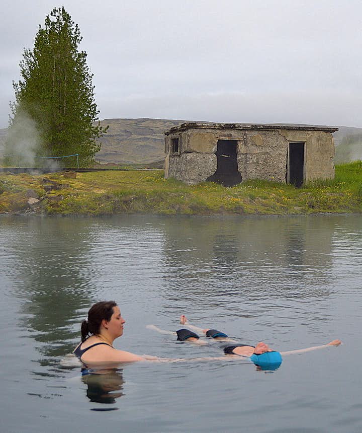 Regína getting a massage in the Secret Lagoon in South-Iceland