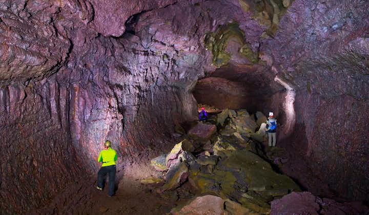Exploring the massive and colorful Vidgelmir lava tube is an incredible experience.