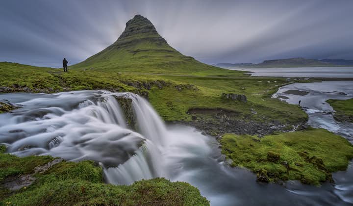 stark and imposing mount kirkjufell covered with moss
