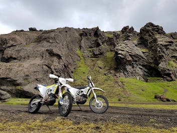 Bikes standing at ready in the lava torn highlands