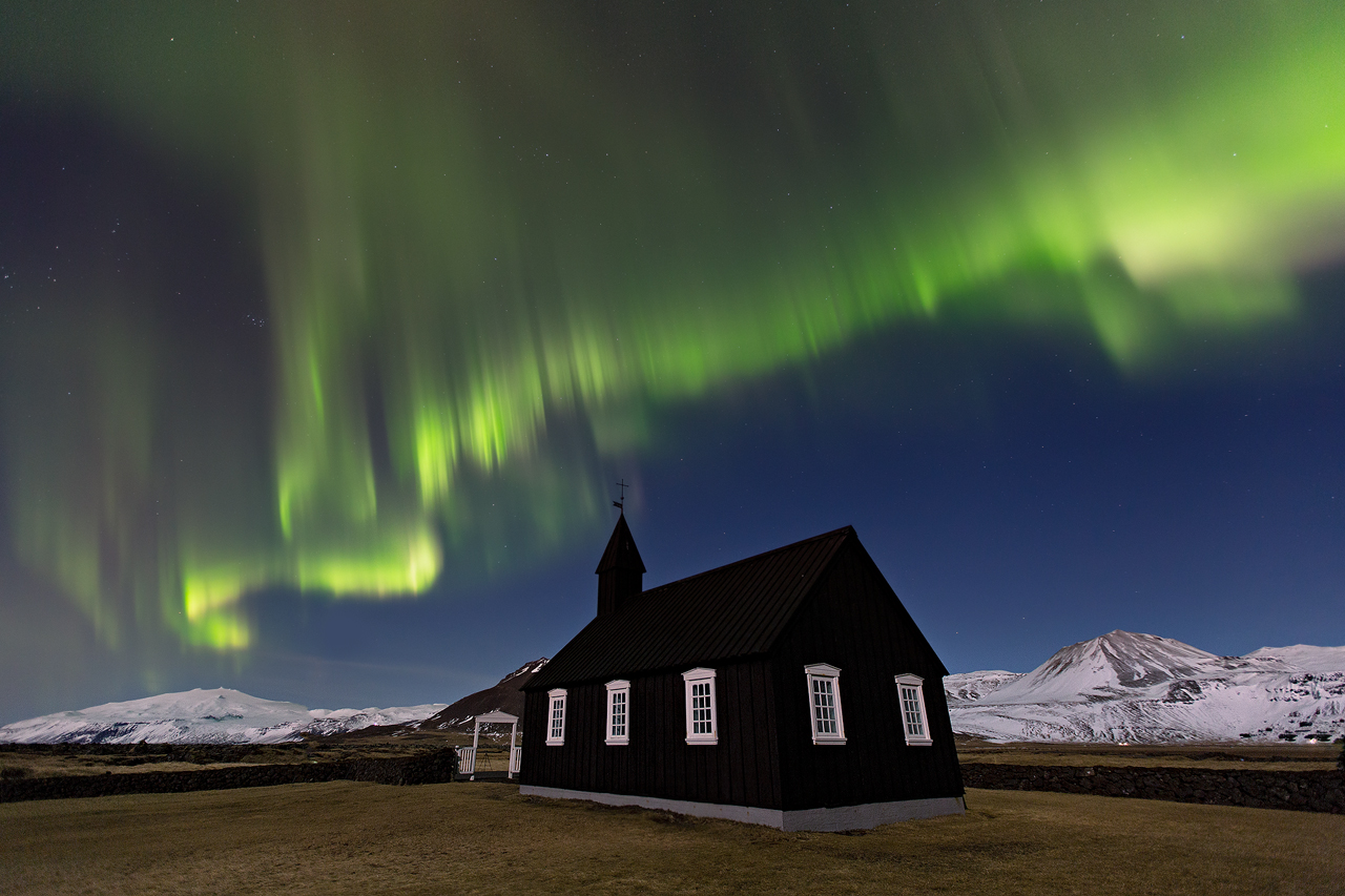 Búðarkirkja church on the Snæfellsnes Peninsula under the Northern Lights.