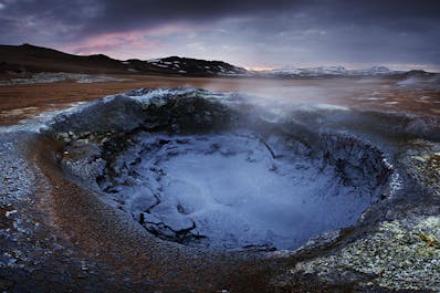 The Northern Lights dancing over a geothermal area near Lake Mývatn.