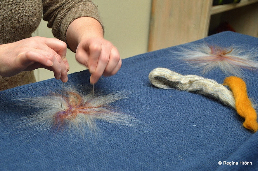 Birna creating patterns at her textile studio at Daladýrð