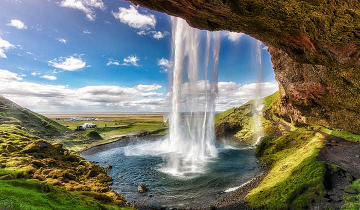 Behind the falling water at Seljalandsfoss waterfall on Iceland's South Coast.