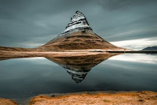 Kirkjufell mountain has a distinct peak that towers over the northern shores of Snaefellsnes.