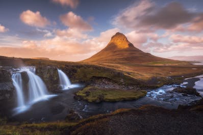 A stunning autumnal shot of Iceland' most photographed mountain, Kirkjufell, reflected on the water's surface.