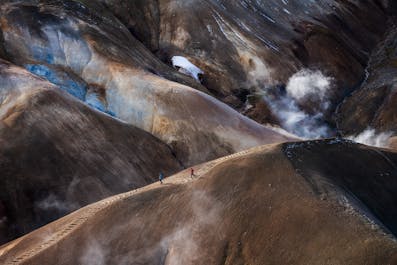 Hraunfossar, a west Iceland waterfall, trickling through a lava field in winter.