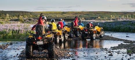 ATV riders traverse rugged and beautiful West Iceland terrain.