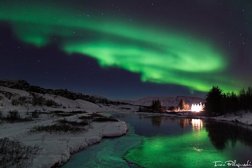 Northern lights reflect beautifully in the waterways that cut through Þingvellir National Park.
