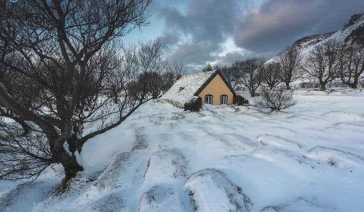 The Hofskirkja turf church in East Iceland under blankets of winter snow.
