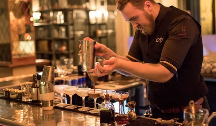 A mixologist mixes cocktails on the Reykjavik Bar Crawl