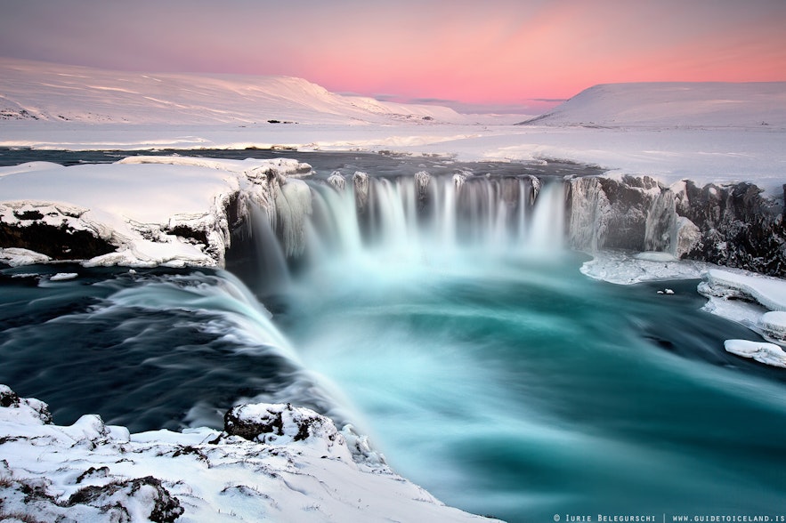 Goðafoss waterfall surrounded by snow and ice