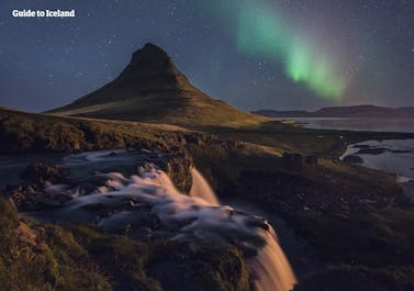 Kirkjufell is a beautiful mountain in west Iceland, shaped like a pyramid or arrow head.
